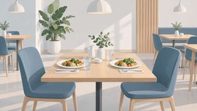 Illustration av ett ljust restaurangbord dukat för två med grönsaker och vatten